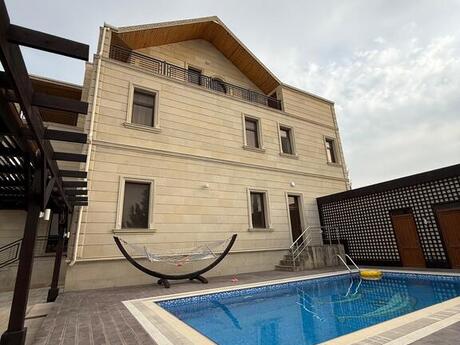 9 otaqlı həyət evi/bağ evi - Novxanı q. - 900 m²