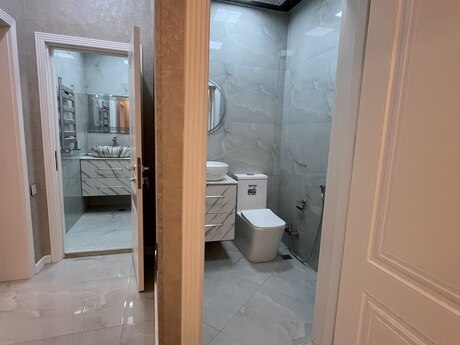 2 otaqlı yeni tikili - 9-cu mikrorayon q. - 98 m²