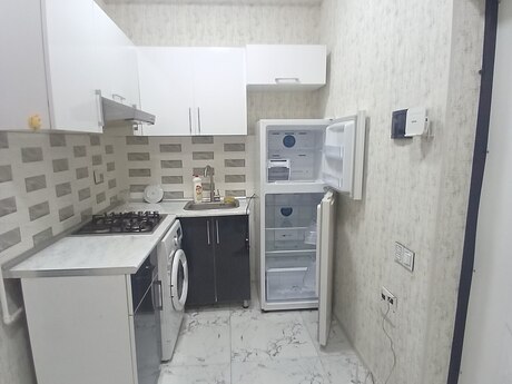 2 otaqlı yeni tikili - İnşaatçılar m. - 65 m²