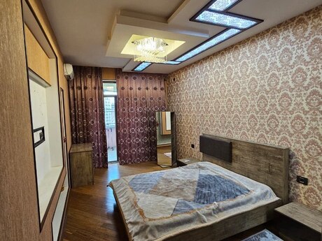4-комн. новостройка - м. Элмляр Академиясы - 200 м²