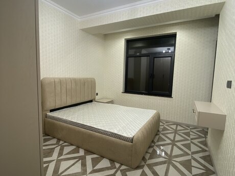 2 otaqlı yeni tikili - İnşaatçılar m. - 55 m²