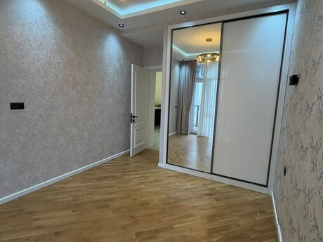 2 otaqlı yeni tikili - 7-ci mikrorayon q. - 77 m²