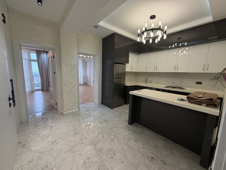 2 otaqlı yeni tikili - 7-ci mikrorayon q. - 77 m²