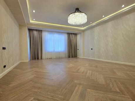 4-комн. новостройка - м. Элмляр Академиясы - 185 м²