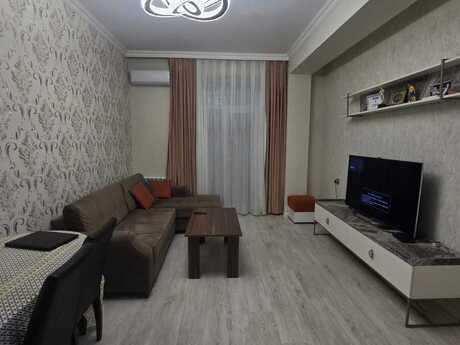 4-комн. новостройка - м. Элмляр Академиясы - 110 м²
