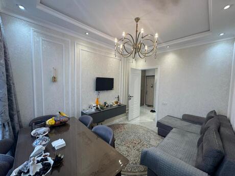 2 otaqlı yeni tikili - 7-ci mikrorayon q. - 53 m²