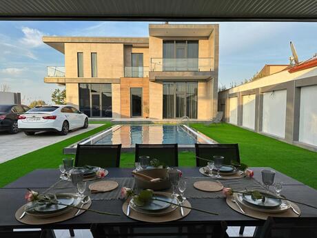 4 otaqlı həyət evi/bağ evi - Novxanı q. - 200 m²