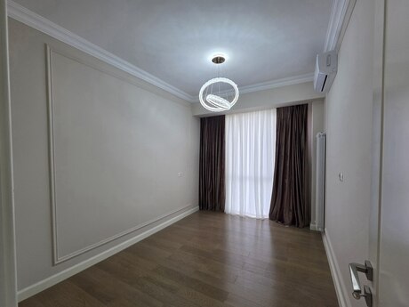4 otaqlı yeni tikili - Bakmil m. - 130 m²