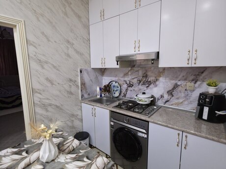 2 otaqlı yeni tikili - Bakıxanov q. - 56 m²