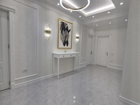 4-комн. новостройка - м. Элмляр Академиясы - 180 м²