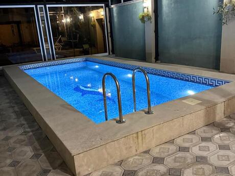 4 otaqlı həyət evi/bağ evi - Novxanı q. - 210 m²