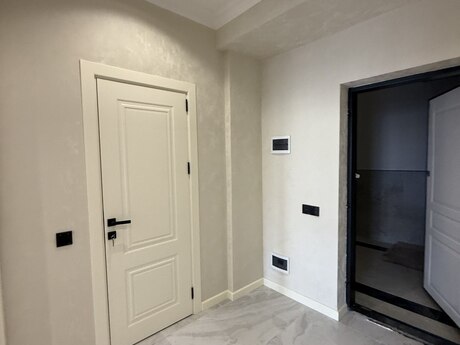 1 otaqlı yeni tikili - İnşaatçılar m. - 56.3 m²
