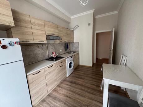 2 otaqlı yeni tikili - İnşaatçılar m. - 56 m²