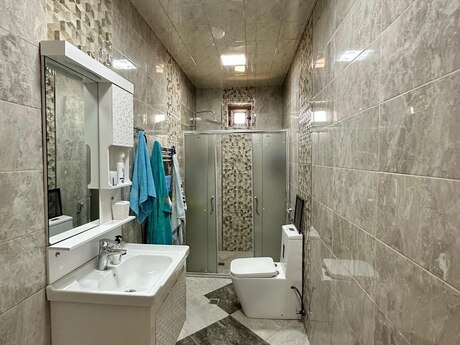 10 otaqlı həyət evi/bağ evi - Hövsan q. - 161.2 m²
