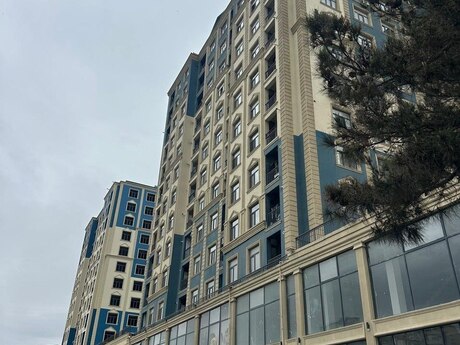 1 otaqlı yeni tikili - İnşaatçılar m. - 56.3 m²