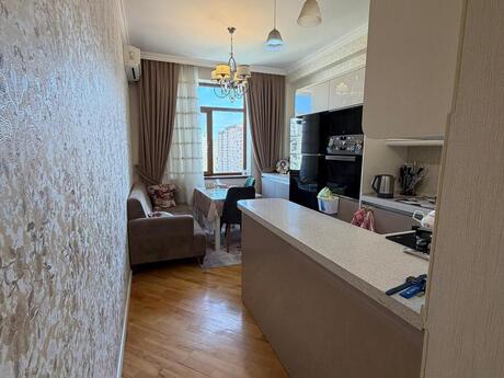 2 otaqlı yeni tikili - İnşaatçılar m. - 82 m²