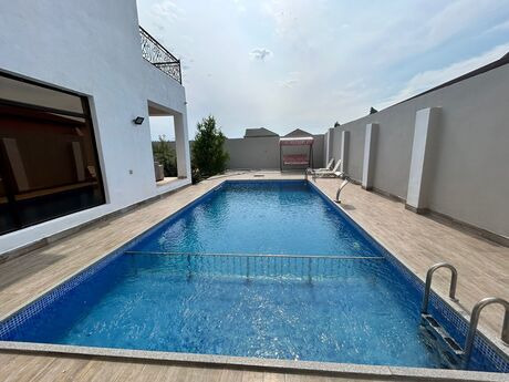 7 otaqlı həyət evi/bağ evi - Novxanı q. - 300 m²