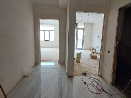 1 otaqlı yeni tikili - İnşaatçılar m. - 56.3 m²