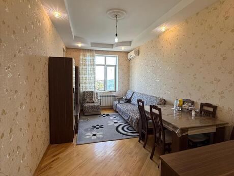 2 otaqlı yeni tikili - İnşaatçılar m. - 70 m²