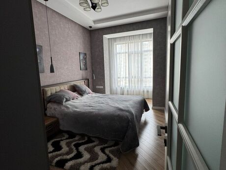 2 otaqlı yeni tikili - İnşaatçılar m. - 65 m²