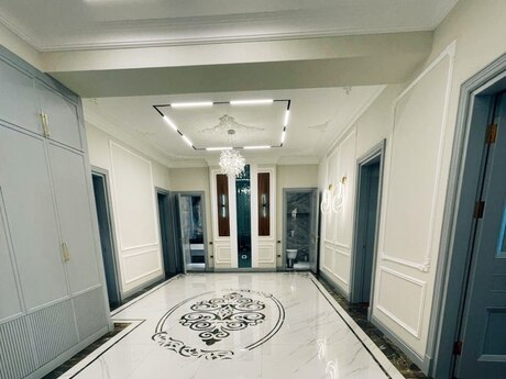 4-комн. новостройка - м. Элмляр Академиясы - 180 м²