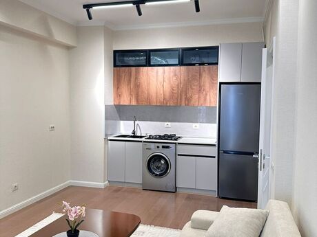 2 otaqlı yeni tikili - İnşaatçılar m. - 49 m²