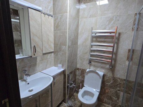 2 otaqlı yeni tikili - İnşaatçılar m. - 70 m²
