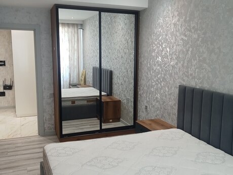 2 otaqlı yeni tikili - İnşaatçılar m. - 60 m²
