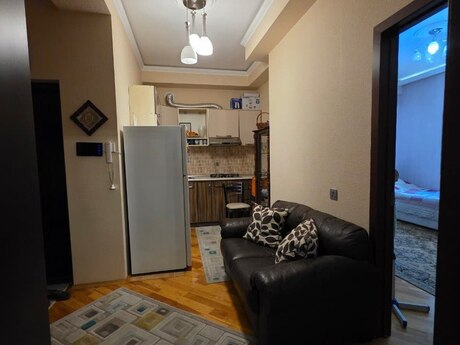 2 otaqlı yeni tikili - İnşaatçılar m. - 56 m²