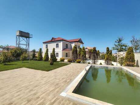 7 otaqlı həyət evi/bağ evi - Novxanı q. - 280 m²