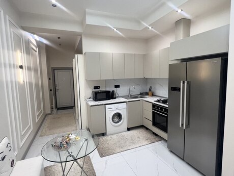 2 otaqlı yeni tikili - İnşaatçılar m. - 71 m²