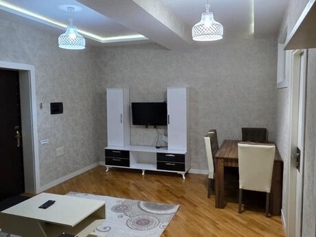 2 otaqlı yeni tikili - İnşaatçılar m. - 70 m²