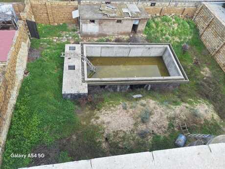 8 otaqlı həyət evi/bağ evi - Novxanı q. - 500 m²