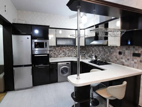 2 otaqlı yeni tikili - 7-ci mikrorayon q. - 66.5 m²