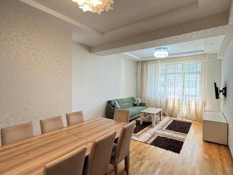 4 rooms · 128 m² · floor 10/18, Gənclik