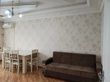 м. Ази Асланов