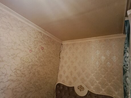 м. Низами