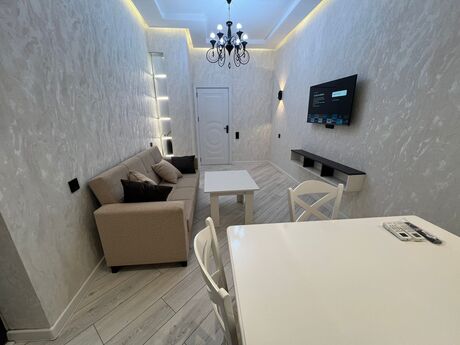 3 rooms · 115 m² · floor 12/18, West Town