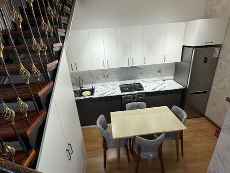 2 otaqlı yeni tikili - İnşaatçılar m. - 65 m²