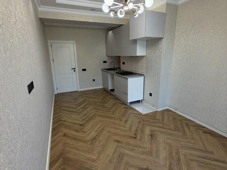 2 otaqlı yeni tikili - İnşaatçılar m. - 58 m²