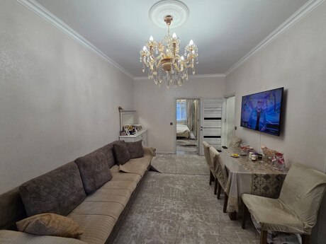 2 rooms · 50 m² · floor 1/5, 7-ci mikrorayon