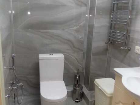 3-room apartment for rent, 70 m², Sahil: 1 200 ₼/mo 3