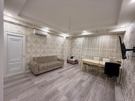 Qurtuluş 93 kompleksində 2 otaqlı yeni tikili mənzil satılır, 52 m², 80 500 AZN, şəkil 2 / 8