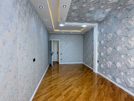 3 otaq · 125 m² · 4/12 mərtəbə, Azadlıq Prospekti