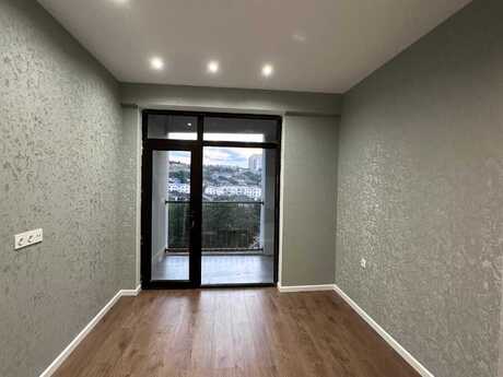 2-room new-build apartment for sale in Qaraçuxur, 54 m², 132 000 AZN, photo 2 / 9