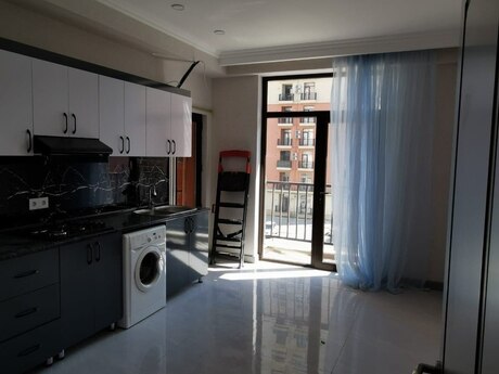2-room new-build apartment for rent in West Town residence, 95 m², 750 AZN/mo, photo 3 / 12