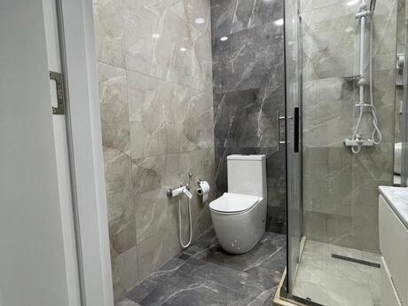 2-room new-build apartment for rent in Nəsimi, 73 m², 1 000 AZN/mo, photo 4 / 12