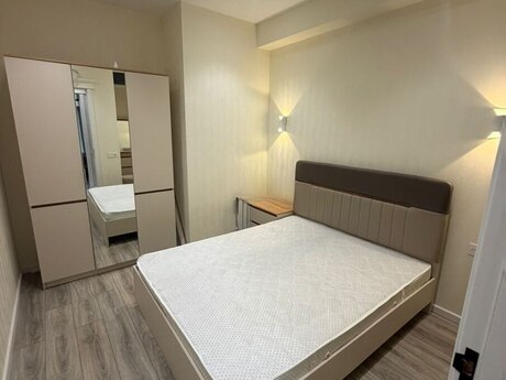 3-room new-build apartment for rent in Zümrüd Residence, 100 m², 1 400 AZN/mo, photo 4 / 10