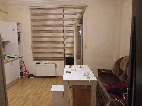 1 otaq · 57 m²