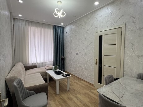 Əhmədlidə 2 otaqlı yeni tikili mənzil satılır, 42 m², 135 000 AZN, şəkil 2 / 12